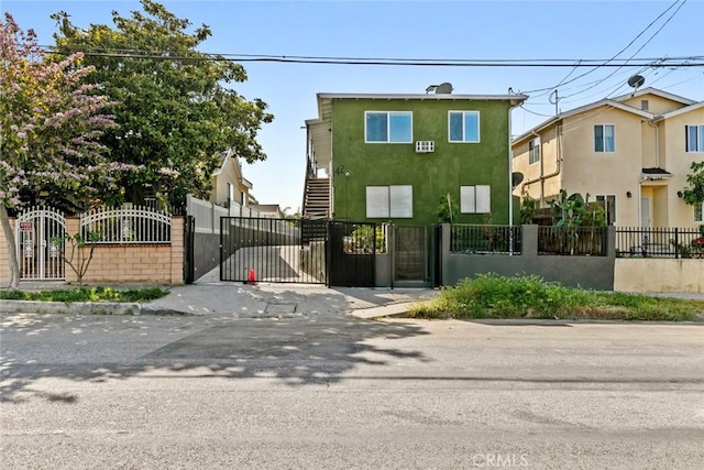 142 S Savannah St, Los Angeles, CA 90033 - gate with a fenced front yard and stairway
