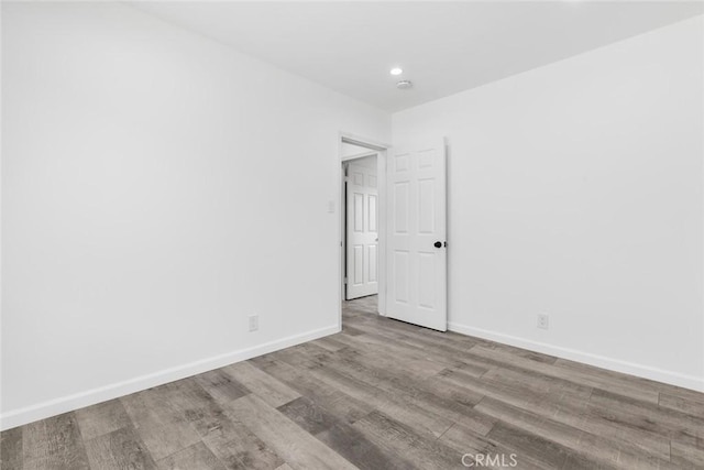 142 S Savannah St, Los Angeles, CA 90033 - spare room featuring wood finished floors, baseboards, and recessed lighting