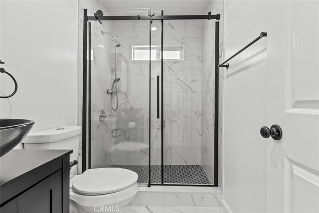 142 S Savannah St, Los Angeles, CA 90033 - bathroom featuring toilet, marble look tiles, a marble finish shower, and vanity