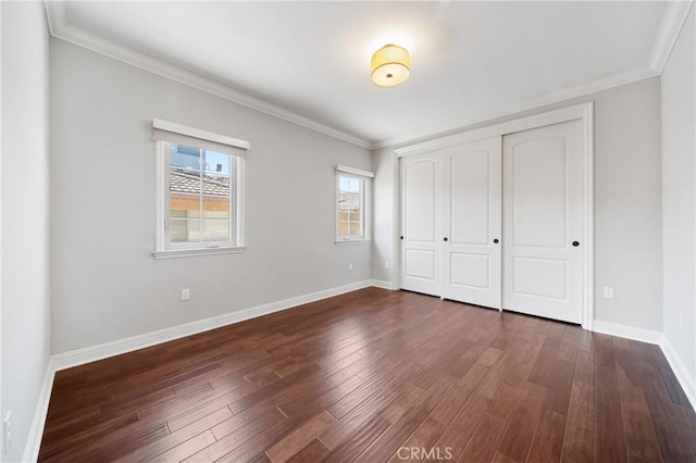 130 Alta St Unit B, Arcadia, CA 91006 - unfurnished bedroom with dark wood-style floors, crown molding, baseboards, and a closet