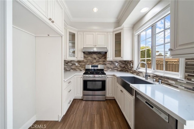 130 Alta St Unit B, Arcadia, CA 91006 - kitchen with stainless steel appliances, a sink, under cabinet range hood, dark wood finished floors, and recessed lighting