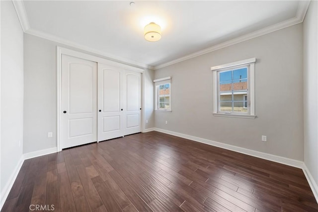 130 Alta St Unit B, Arcadia, CA 91006 - unfurnished bedroom with baseboards, a closet, ornamental molding, and dark wood-type flooring