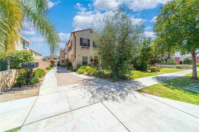 130 Alta St Unit B, Arcadia, CA 91006 - view of front facade with stucco siding and a residential view