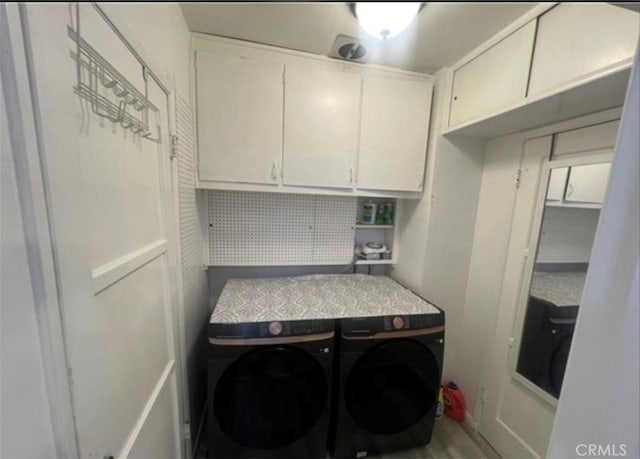 18763 Sunburst St, Northridge, CA 91324 - laundry room featuring cabinet space and washer and dryer