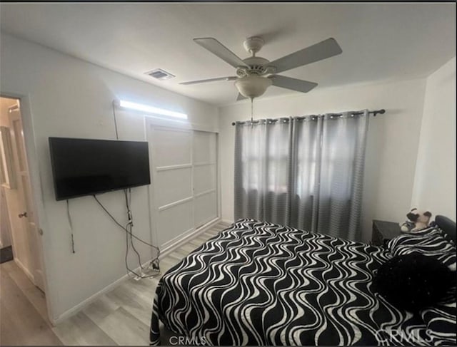18763 Sunburst St, Northridge, CA 91324 - bedroom featuring light wood finished floors, ceiling fan, and baseboards