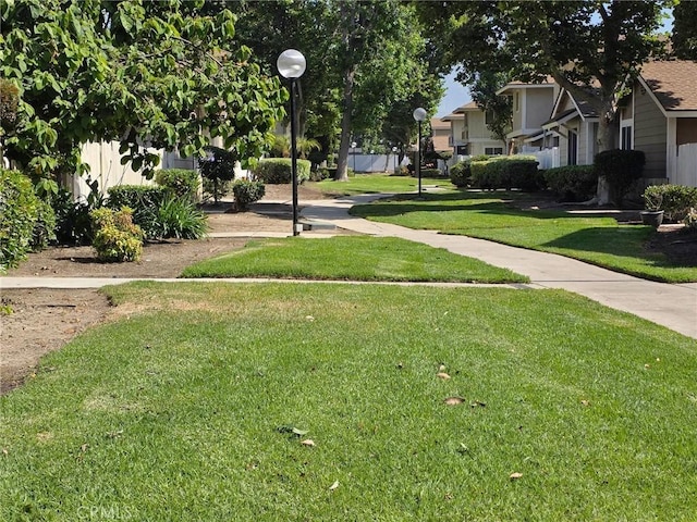 1650 S Campus Ave Unit 41, Ontario, CA 91761 - view of community featuring a yard and a residential view