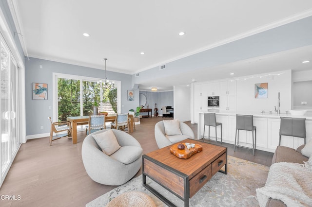 320 Starlane Dr, La Canada Flintridge, CA 91011 - living area featuring light wood-style floors, recessed lighting, ornamental molding, baseboards, and a chandelier