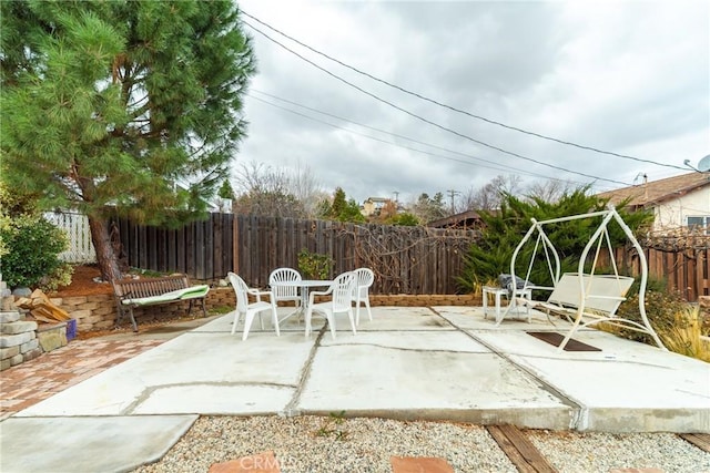 42868 Ranch Club Rd, Lake Elizabeth, CA 93532 - fenced backyard with a patio area and outdoor dining area