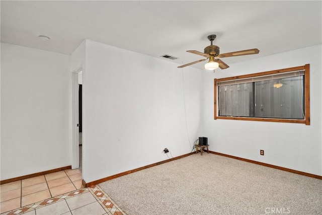 42868 Ranch Club Rd, Lake Elizabeth, CA 93532 - unfurnished room with baseboards, a ceiling fan, and light tile patterned flooring