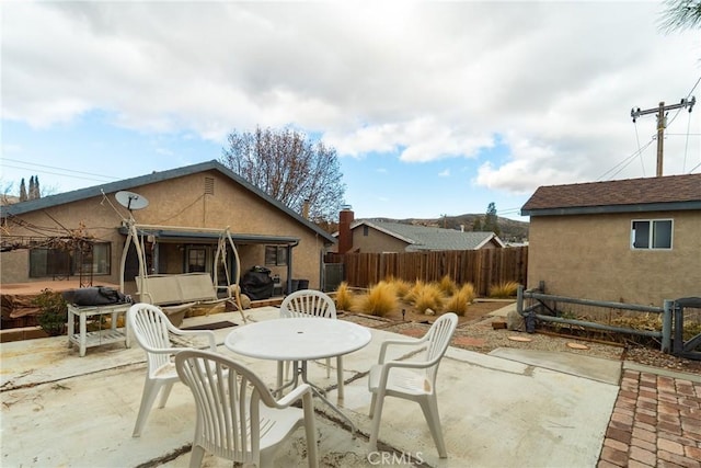 42868 Ranch Club Rd, Lake Elizabeth, CA 93532 - fenced backyard with a patio area and outdoor dining space