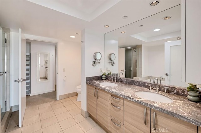 13650 Marina Pointe Dr Unit 908, Marina Del Rey, CA 90292 - full bath featuring a tray ceiling, double vanity, baseboards, recessed lighting, and toilet