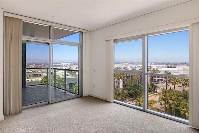 13650 Marina Pointe Dr Unit 908, Marina Del Rey, CA 90292 - spare room with carpet flooring, floor to ceiling windows, and a view of city