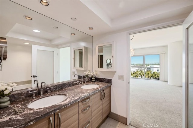 13650 Marina Pointe Dr Unit 908, Marina Del Rey, CA 90292 - full bath with a tray ceiling, double vanity, recessed lighting, and baseboards