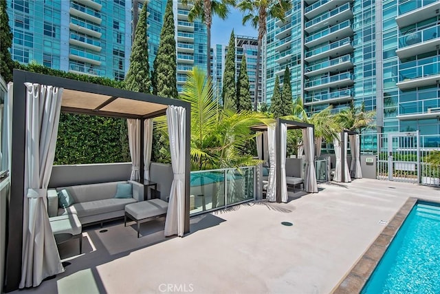 13650 Marina Pointe Dr Unit 908, Marina Del Rey, CA 90292 - community pool with an outdoor living space, a patio area, and a city view