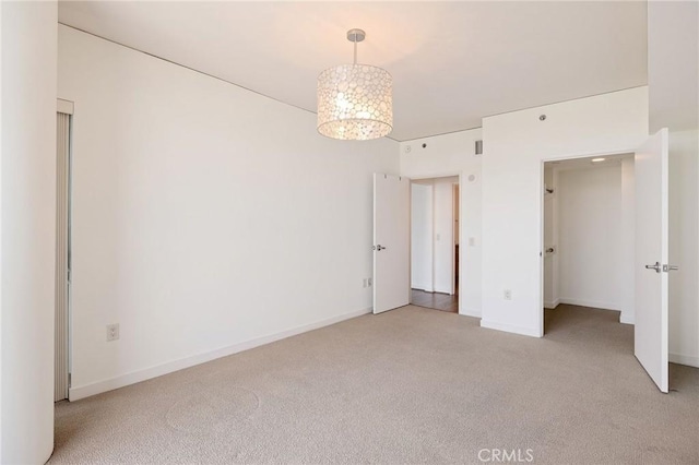 13650 Marina Pointe Dr Unit 908, Marina Del Rey, CA 90292 - unfurnished bedroom featuring light colored carpet and baseboards