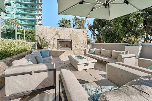 13650 Marina Pointe Dr Unit 908, Marina Del Rey, CA 90292 - view of patio / terrace with an outdoor living space with a fireplace