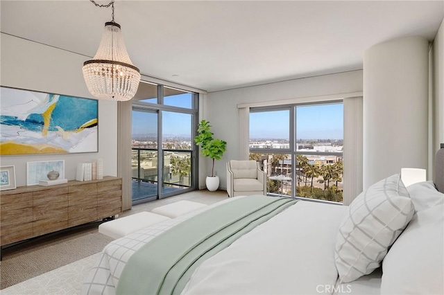 13650 Marina Pointe Dr Unit 908, Marina Del Rey, CA 90292 - bedroom featuring a chandelier, access to outside, and expansive windows