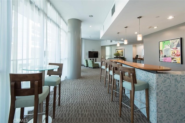 13650 Marina Pointe Dr Unit 908, Marina Del Rey, CA 90292 - bar area featuring carpet, decorative light fixtures, and recessed lighting