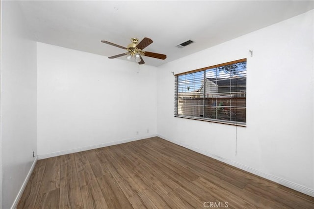 4060 Olive St, Chino, CA 91710 - unfurnished room featuring wood finished floors, ceiling fan, and baseboards