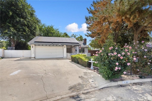 4060 Olive St, Chino, CA 91710 - view of front of home featuring roof mounted solar panels