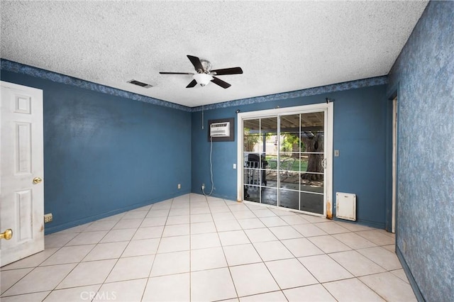 4060 Olive St, Chino, CA 91710 - spare room featuring ceiling fan, an AC wall unit, and a textured ceiling