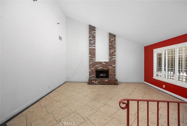 4060 Olive St, Chino, CA 91710 - unfurnished living room featuring vaulted ceiling and a fireplace