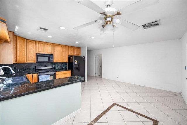 4060 Olive St, Chino, CA 91710 - kitchen with black appliances, a sink, ceiling fan, light tile patterned floors, and decorative backsplash