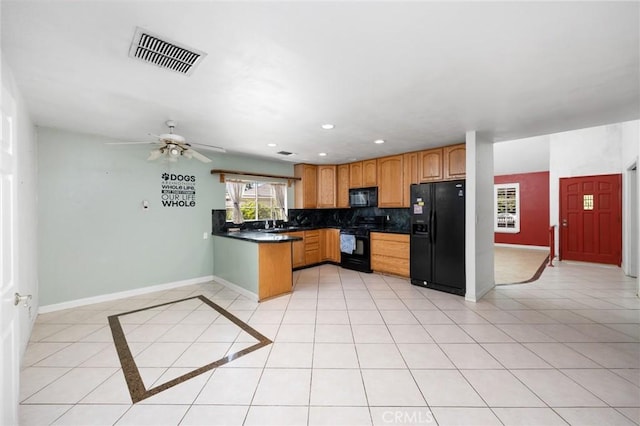 4060 Olive St, Chino, CA 91710 - kitchen with black appliances, baseboards, backsplash, ceiling fan, and dark countertops
