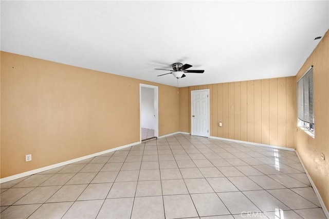 4060 Olive St, Chino, CA 91710 - spare room with a ceiling fan, baseboards, and light tile patterned flooring