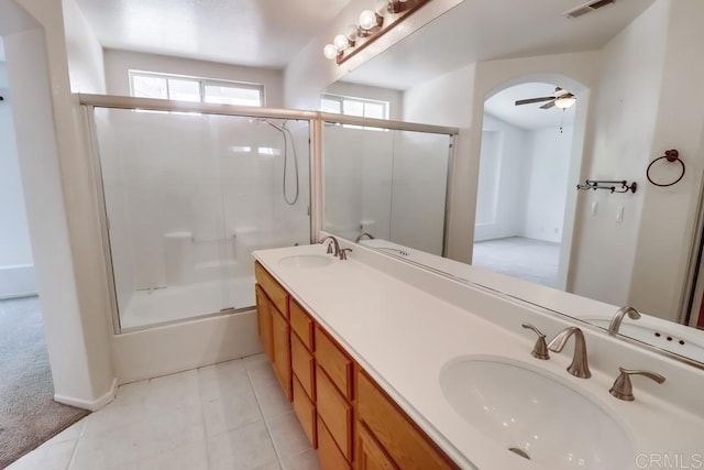 2407 Eastridge Loop, Chula Vista, CA 91915 - bathroom featuring double vanity, bath / shower combo with glass door, tile patterned floors, a ceiling fan, and baseboards