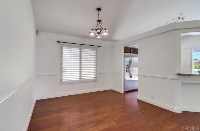 2407 Eastridge Loop, Chula Vista, CA 91915 - unfurnished room with dark wood finished floors, a chandelier, and baseboards