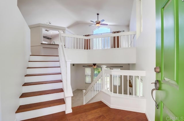 2407 Eastridge Loop, Chula Vista, CA 91915 - stairs featuring a ceiling fan, wood finished floors, and vaulted ceiling