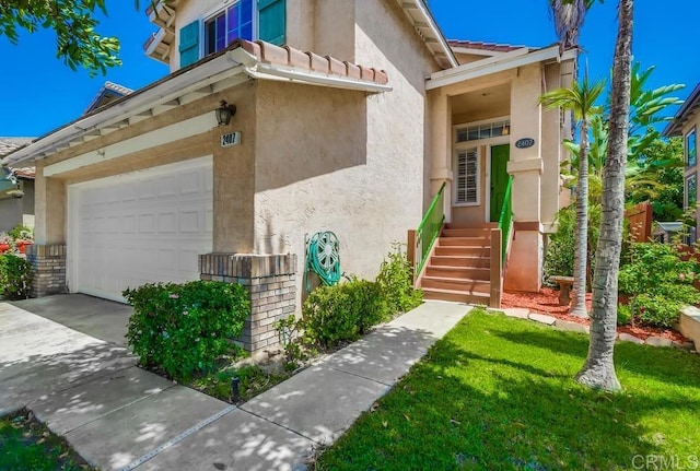 2407 Eastridge Loop, Chula Vista, CA 91915 - view of front of property featuring stucco siding, driveway, a front yard, and a tile roof