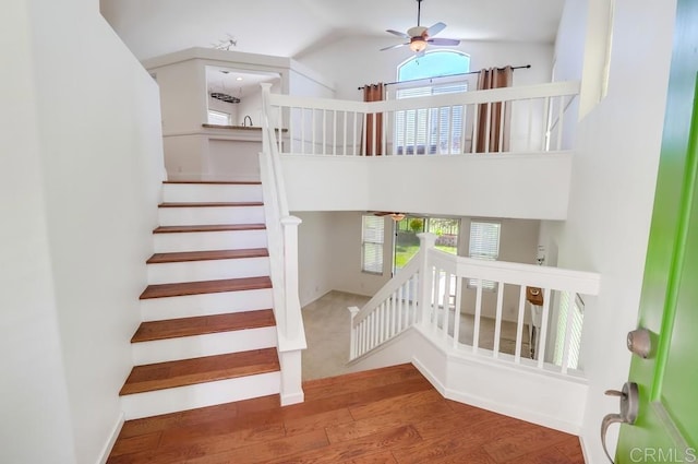 2407 Eastridge Loop, Chula Vista, CA 91915 - stairs with plenty of natural light, a ceiling fan, wood finished floors, and lofted ceiling