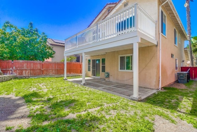 2407 Eastridge Loop, Chula Vista, CA 91915 - rear view of house with a patio and stucco siding