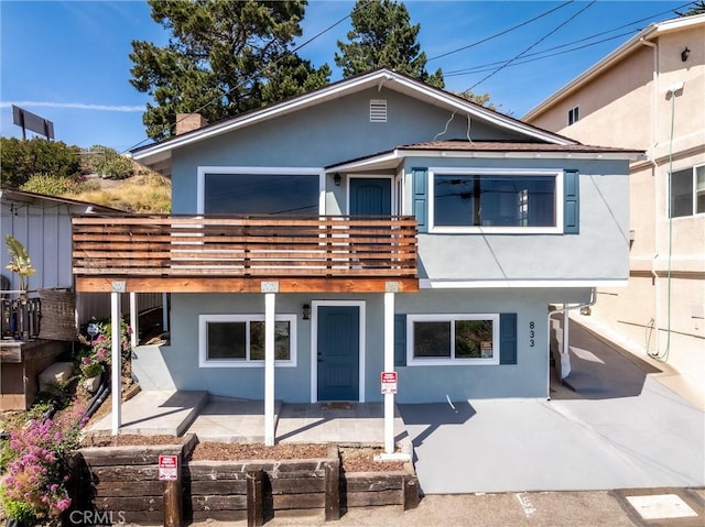 833 Park Ave, Cayucos, CA 93430 - back of property with stucco siding, a balcony, and a patio