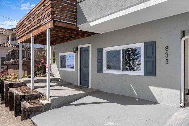 833 Park Ave, Cayucos, CA 93430 - entrance to property featuring stucco siding