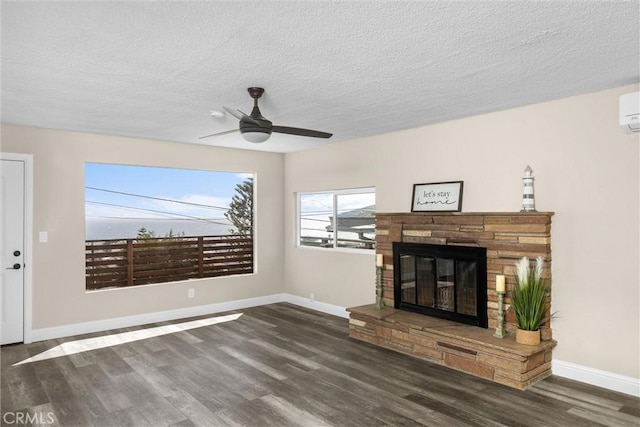 833 Park Ave, Cayucos, CA 93430 - unfurnished living room with wood finished floors, baseboards, a fireplace, a textured ceiling, and ceiling fan