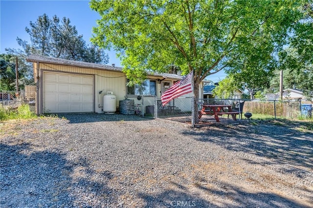 3970 Oakland Ave, Clearlake, CA 95422 - view of front of home featuring a garage and driveway