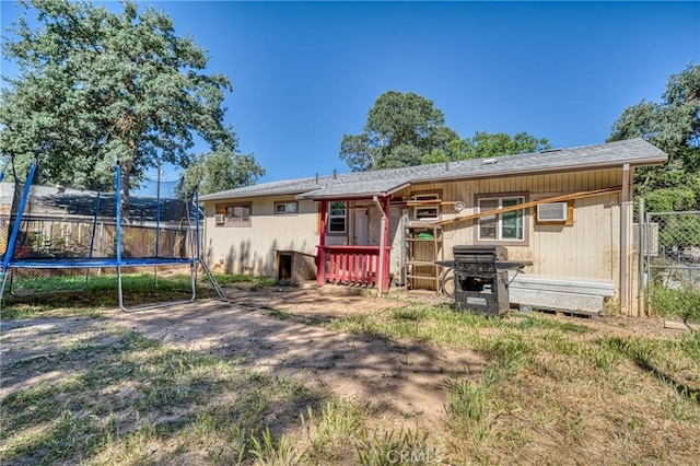 3970 Oakland Ave, Clearlake, CA 95422 - rear view of house with a trampoline
