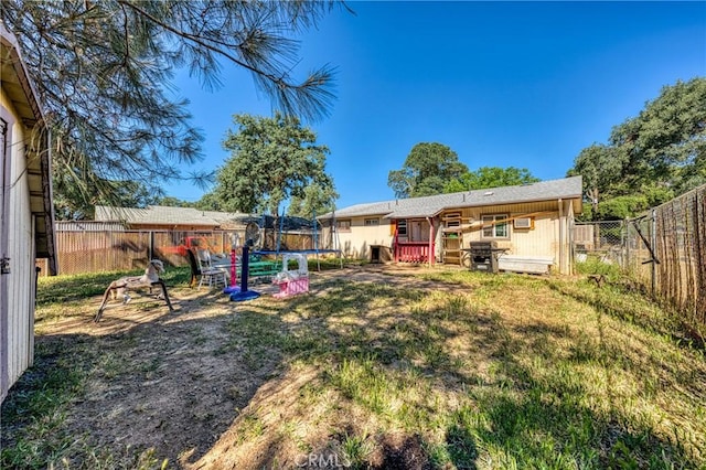 3970 Oakland Ave, Clearlake, CA 95422 - fenced backyard with a trampoline