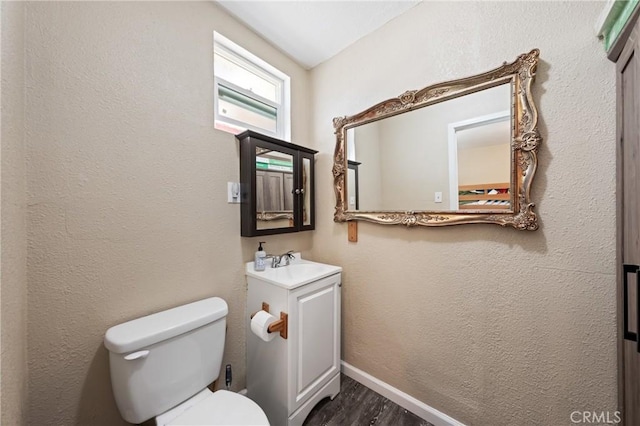 3970 Oakland Ave, Clearlake, CA 95422 - half bathroom featuring wood finished floors and vanity
