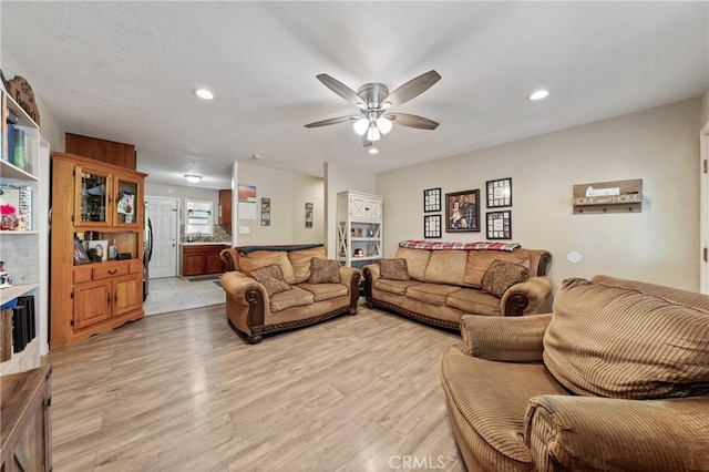 3970 Oakland Ave, Clearlake, CA 95422 - living room featuring a ceiling fan, light wood finished floors, and recessed lighting