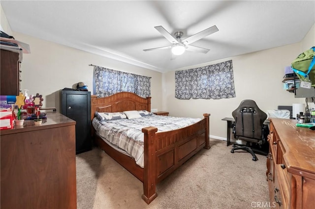 3970 Oakland Ave, Clearlake, CA 95422 - bedroom featuring light colored carpet, ceiling fan, and a desk
