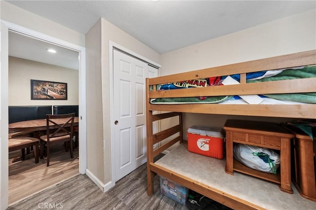 3970 Oakland Ave, Clearlake, CA 95422 - bedroom featuring wood finished floors and a closet
