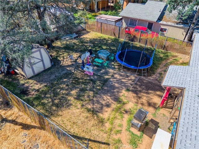 3970 Oakland Ave, Clearlake, CA 95422 - fenced backyard featuring a trampoline and a shed