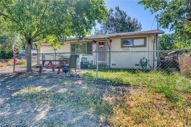 3970 Oakland Ave, Clearlake, CA 95422 - view of front of house featuring a fenced front yard and a garage