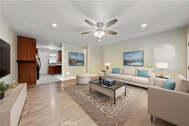3970 Oakland Ave, Clearlake, CA 95422 - living room with light wood finished floors, ceiling fan, and recessed lighting