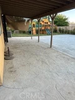 44423 Byron St, Lancaster, CA 93535 - view of patio / terrace featuring a playground and an attached carport