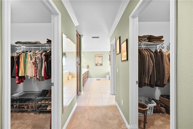 1625 Valley Falls Ave, Redlands, CA 92374 - corridor featuring ornamental molding, light carpet, and light tile patterned flooring